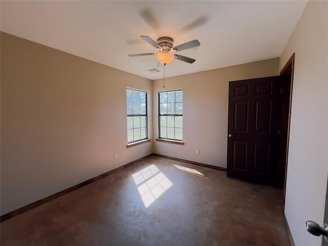 empty room featuring ceiling fan