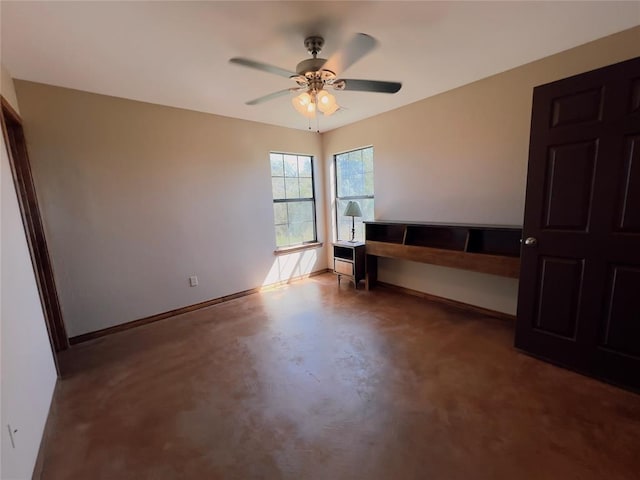 unfurnished bedroom featuring concrete flooring and ceiling fan