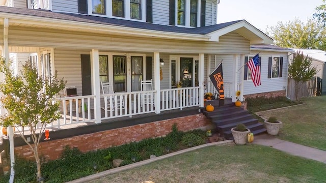 doorway to property featuring a porch