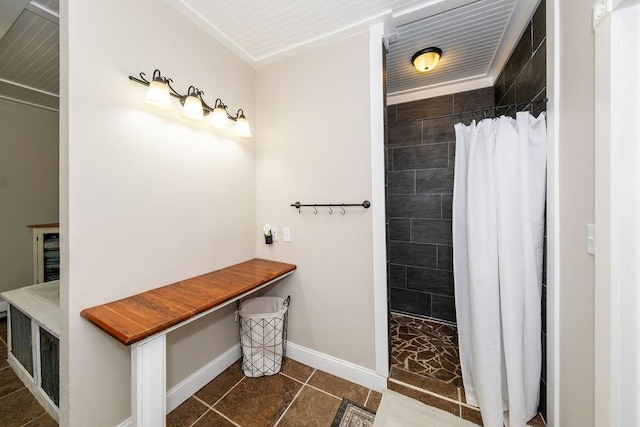 bathroom featuring tile patterned floors and curtained shower