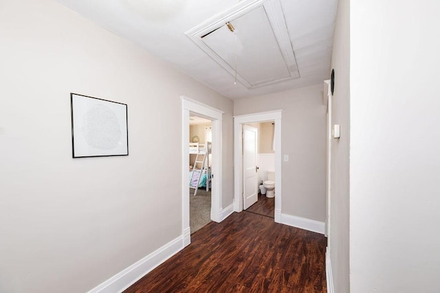 611 Wichita Ave, Devol, OK 73531 - corridor with attic access, baseboards, and wood finished floors
