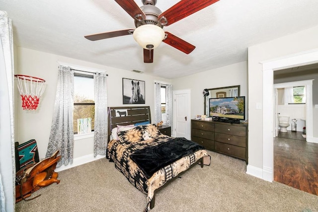 611 Wichita Ave, Devol, OK 73531 - carpeted bedroom featuring baseboards and a ceiling fan