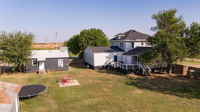 view of yard with a trampoline