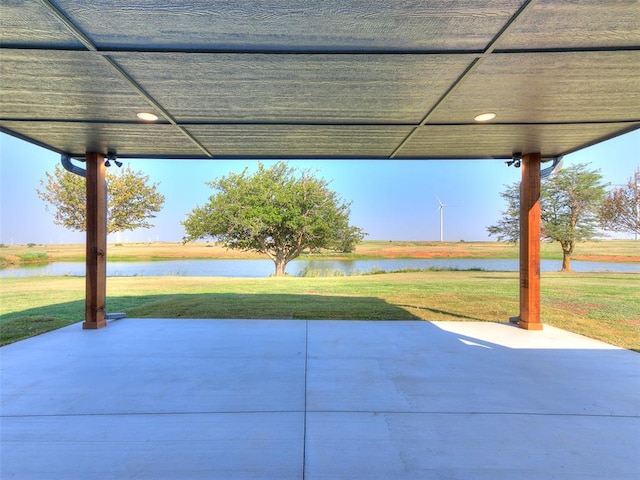 view of patio / terrace featuring a water view