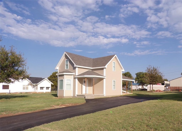 view of front of home featuring a front lawn