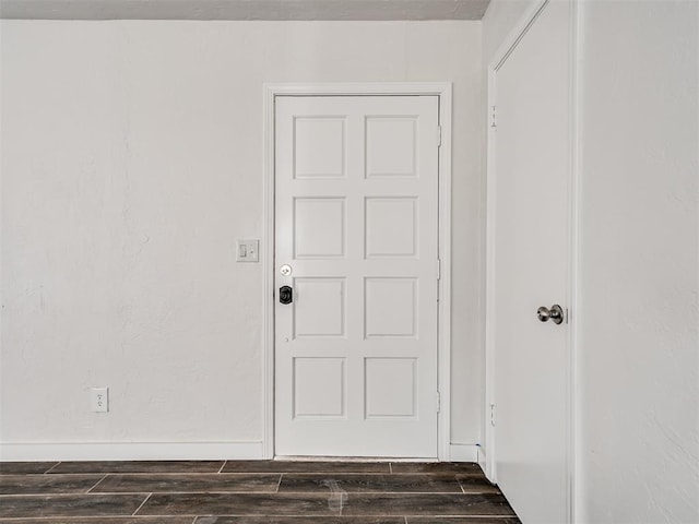 interior space featuring dark wood-type flooring