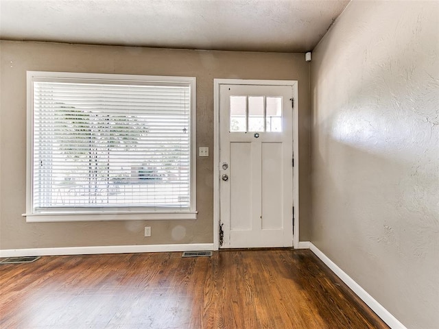 entryway featuring dark hardwood / wood-style floors