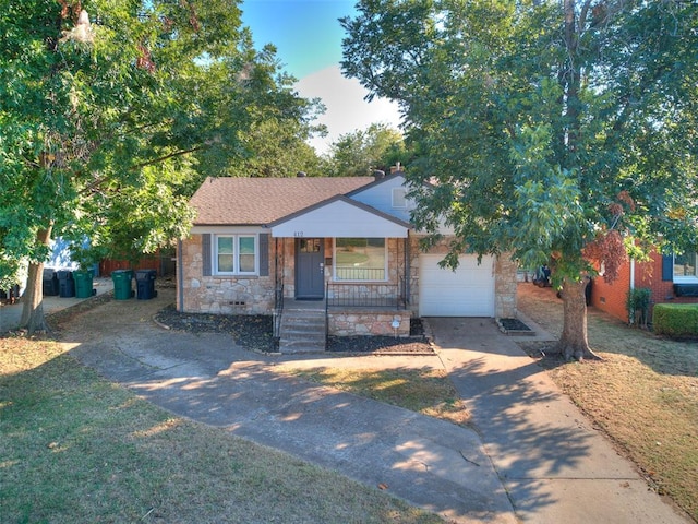 view of front facade with a garage and covered porch