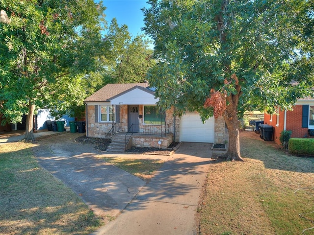 view of front of house featuring a porch and a garage