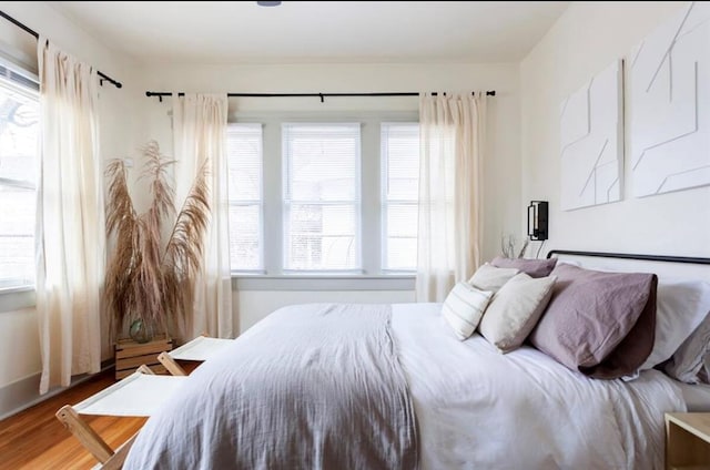 bedroom featuring hardwood / wood-style flooring