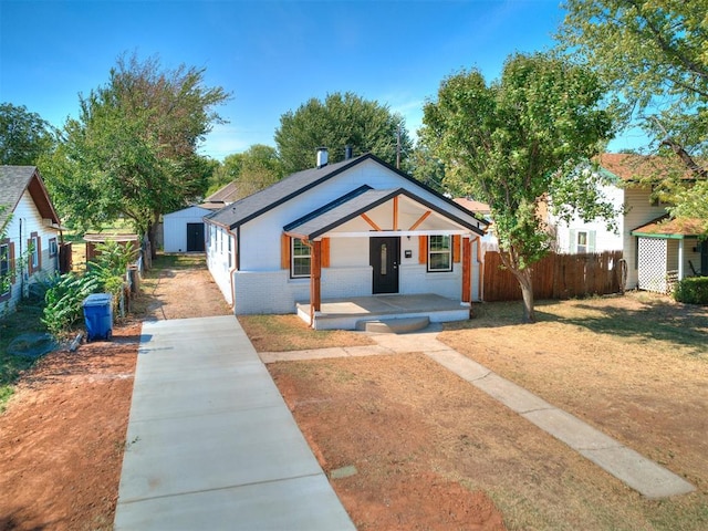 bungalow-style house with covered porch