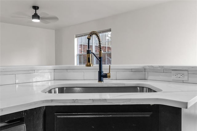 details featuring ceiling fan and sink