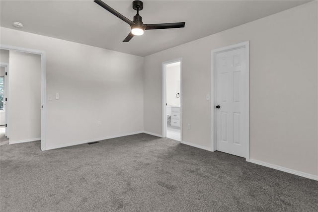 carpeted empty room with ceiling fan