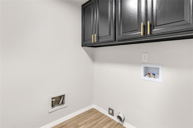 clothes washing area with washer hookup, hookup for an electric dryer, cabinets, and light hardwood / wood-style flooring