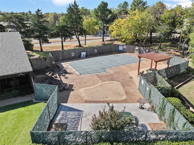 view of sport court featuring a pergola