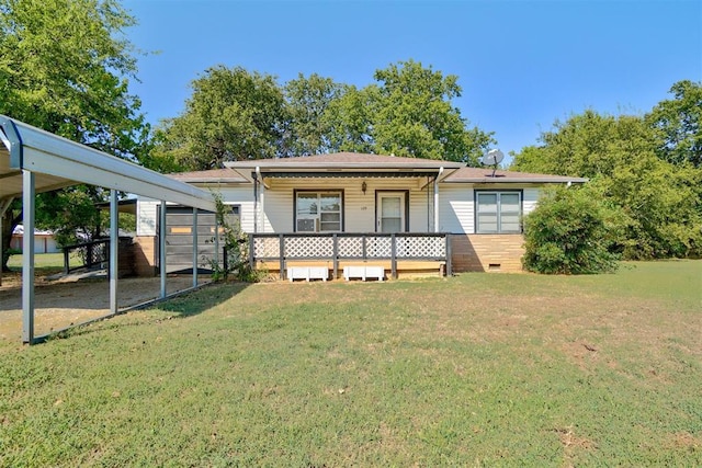 view of front of home featuring a front yard and a carport