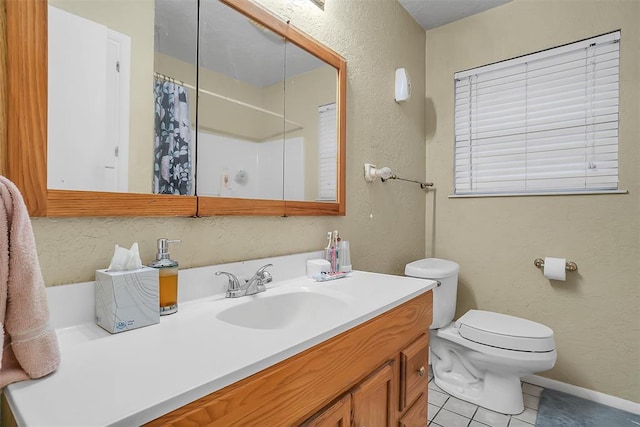 bathroom with tile patterned floors, vanity, toilet, and a shower with curtain