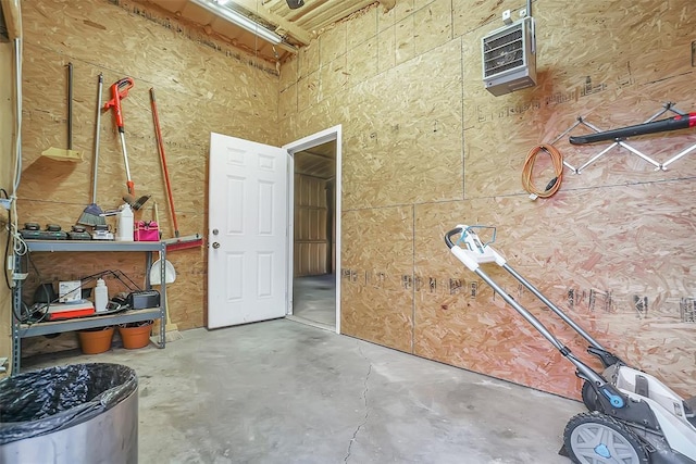 1304 N Market St, Cordell, OK 73632 - miscellaneous room with concrete floors and a heating unit