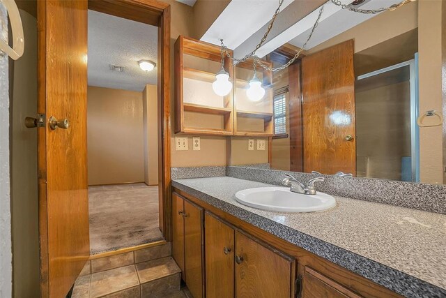 420 W 8th St, Cordell, OK 73632 - bathroom with vanity and tile patterned flooring