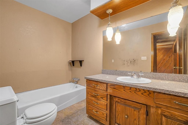 bathroom with tile patterned flooring, vanity, a bathtub, and toilet