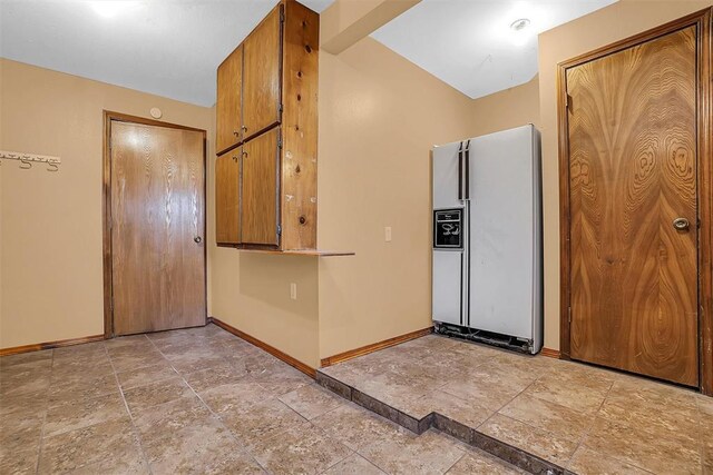 420 W 8th St, Cordell, OK 73632 - spare room with stone tile floors and baseboards