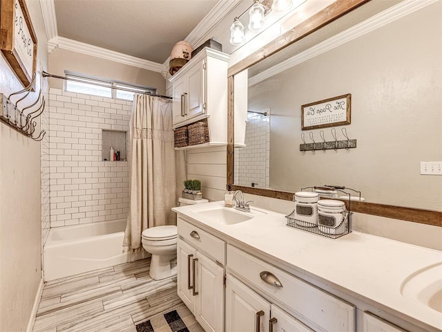 full bathroom featuring crown molding, vanity, shower / bath combination with curtain, and toilet