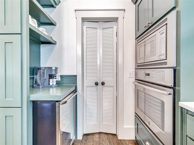 kitchen with light wood-type flooring and stainless steel appliances