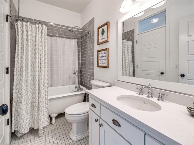 full bathroom featuring toilet, vanity, tile patterned floors, and shower / tub combo with curtain