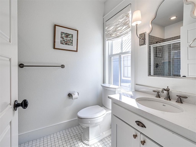 bathroom featuring walk in shower, tile patterned flooring, vanity, and toilet