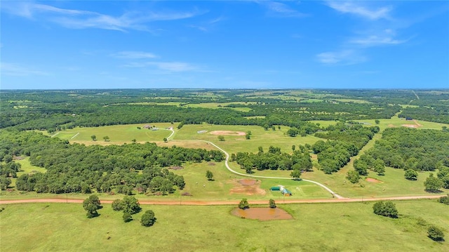 birds eye view of property with a rural view