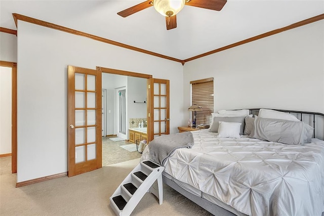 bedroom with ensuite bath, ceiling fan, french doors, and light carpet