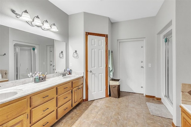 bathroom with vanity, tile patterned floors, and an enclosed shower