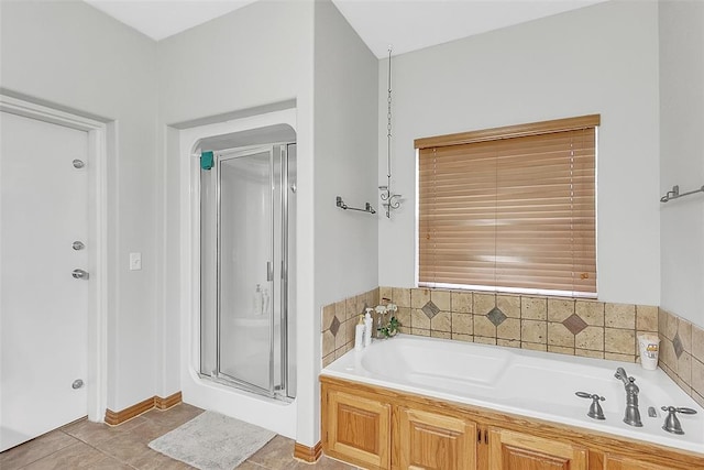 bathroom featuring tile patterned floors and plus walk in shower