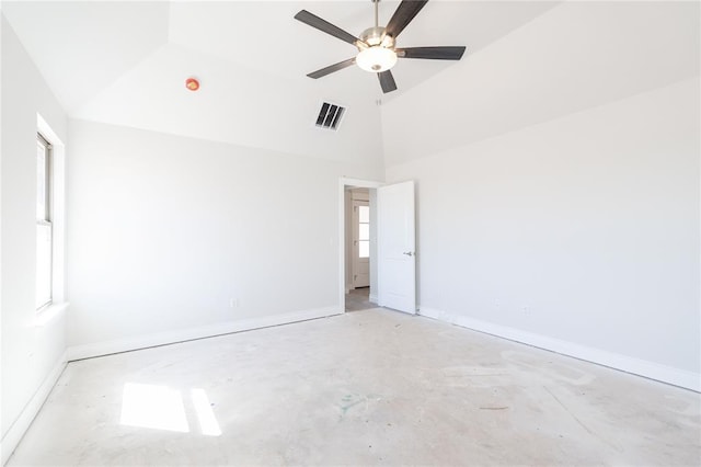 empty room featuring visible vents, high vaulted ceiling, unfinished concrete flooring, baseboards, and ceiling fan