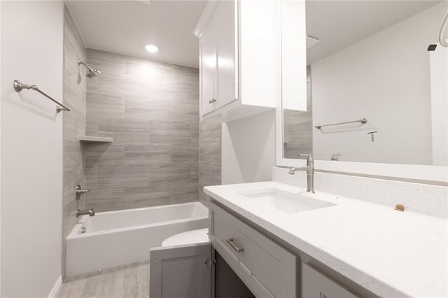 full bath with vanity and shower / bath combination