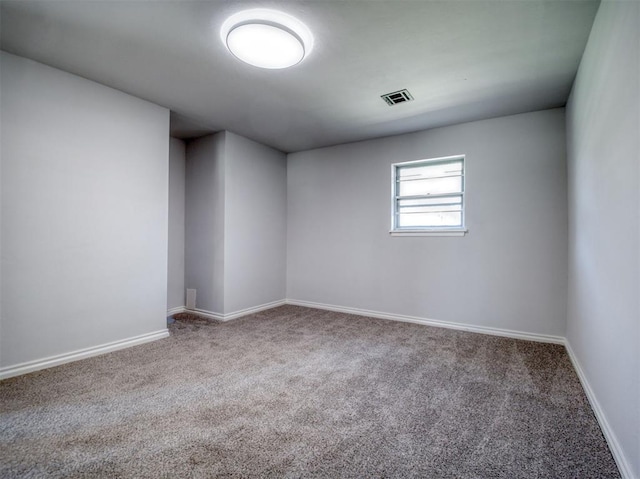 unfurnished room with carpet floors