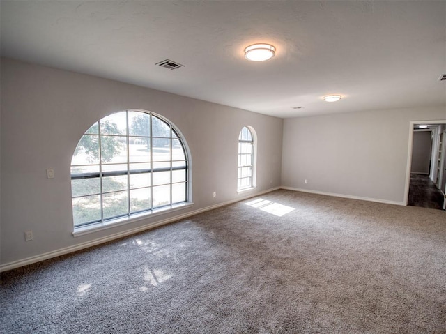 view of carpeted spare room