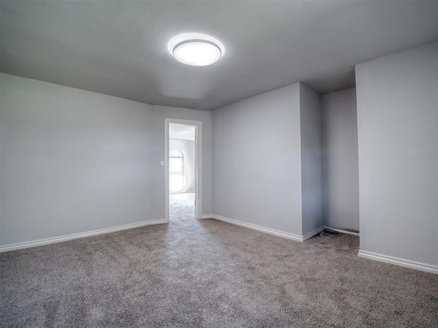 unfurnished room with carpet