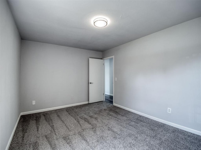 empty room featuring carpet floors