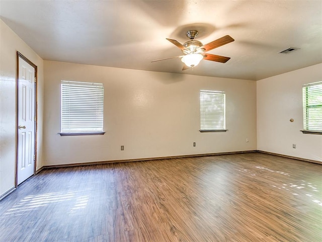 unfurnished room featuring ceiling fan and light hardwood / wood-style floors