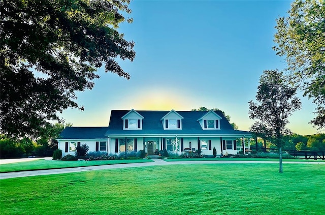 view of front of home with a yard