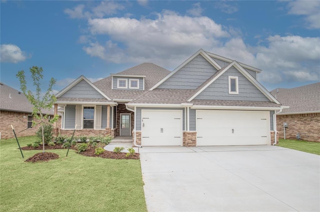 9309 Cheek Ranch Rd, Yukon, OK 73099 - craftsman-style home with driveway, a shingled roof, a front lawn, and a garage