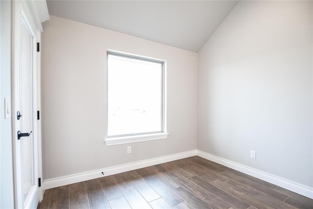 9309 Cheek Ranch Rd, Yukon, OK 73099 - empty room with baseboards, lofted ceiling, and dark wood-type flooring