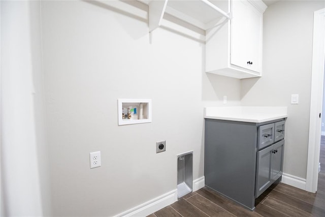 9309 Cheek Ranch Rd, Yukon, OK 73099 - laundry room with dark wood-style flooring, baseboards, hookup for an electric dryer, cabinet space, and washer hookup