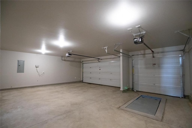 9309 Cheek Ranch Rd, Yukon, OK 73099 - garage featuring a garage door opener and electric panel
