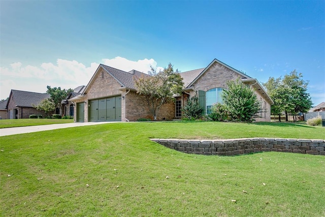 single story home with a garage and a front lawn