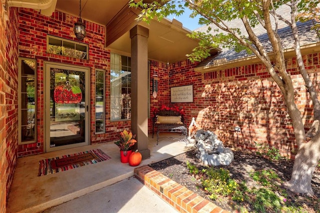 property entrance with covered porch