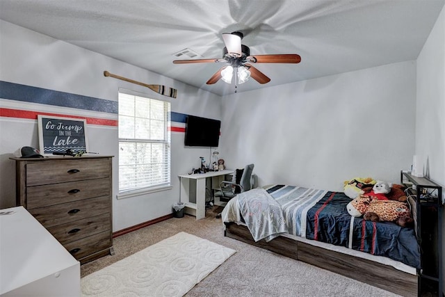 bedroom with light colored carpet and ceiling fan