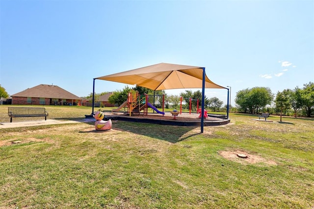 view of playground featuring a lawn