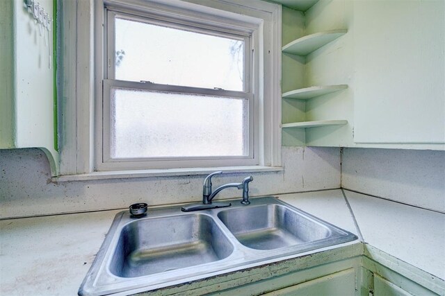 1413 Reding Dr, Oklahoma City, OK 73119 - kitchen with a sink, open shelves, and light countertops